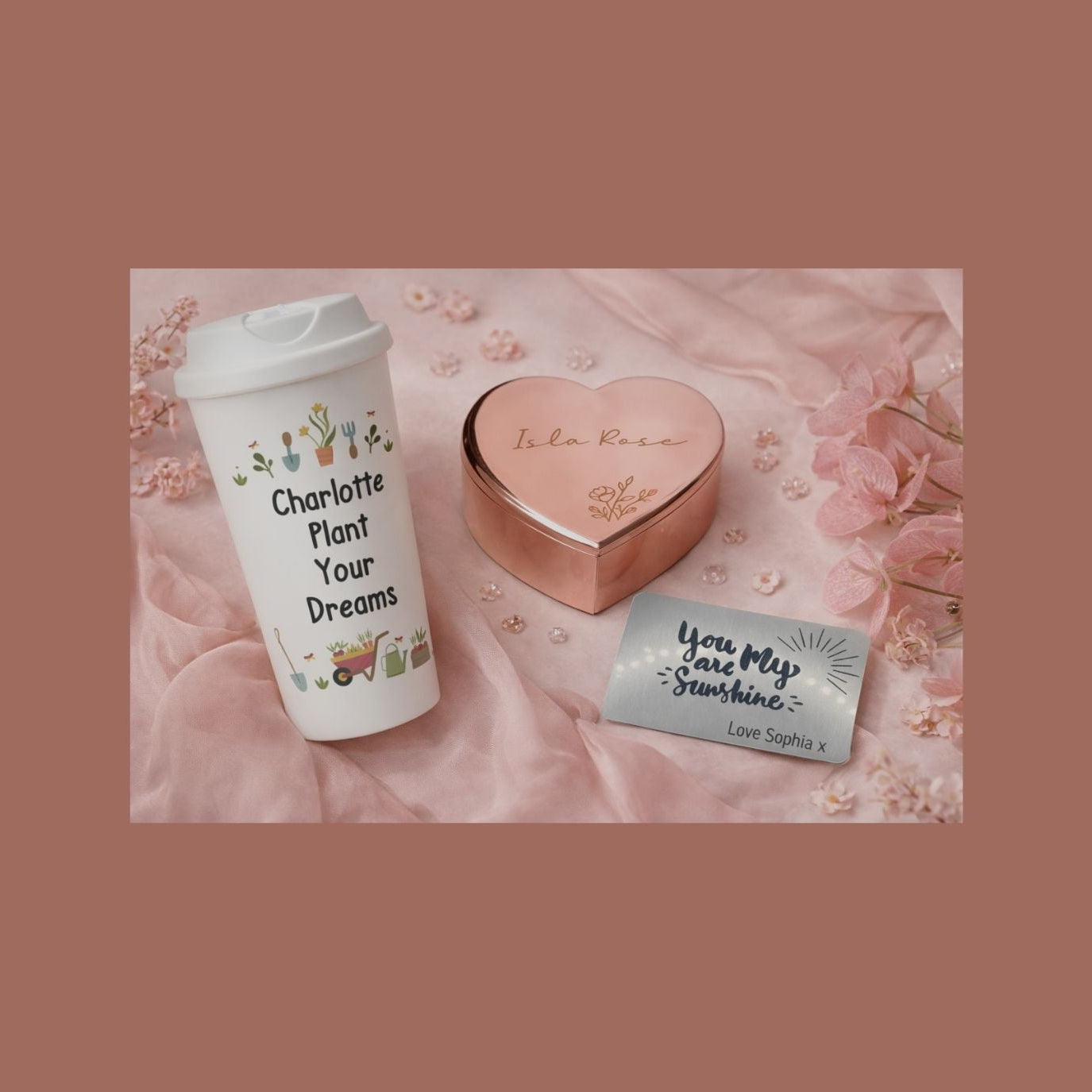 Blog Banner - Personalised gifts on a pink background, travel mug, trinket box and a wallet card insert