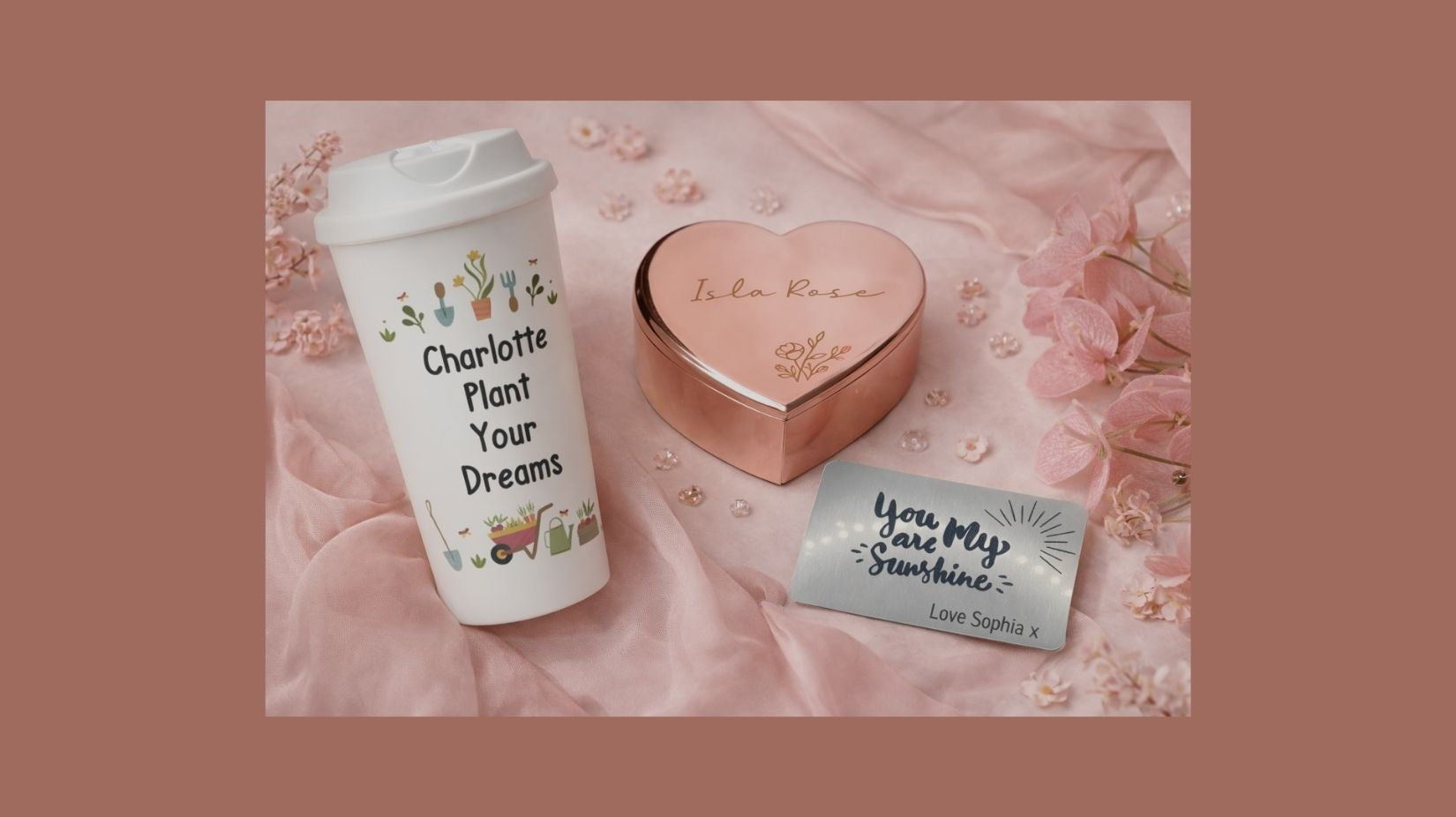 Blog Banner - Personalised gifts on a pink background, travel mug, trinket box and a wallet card insert