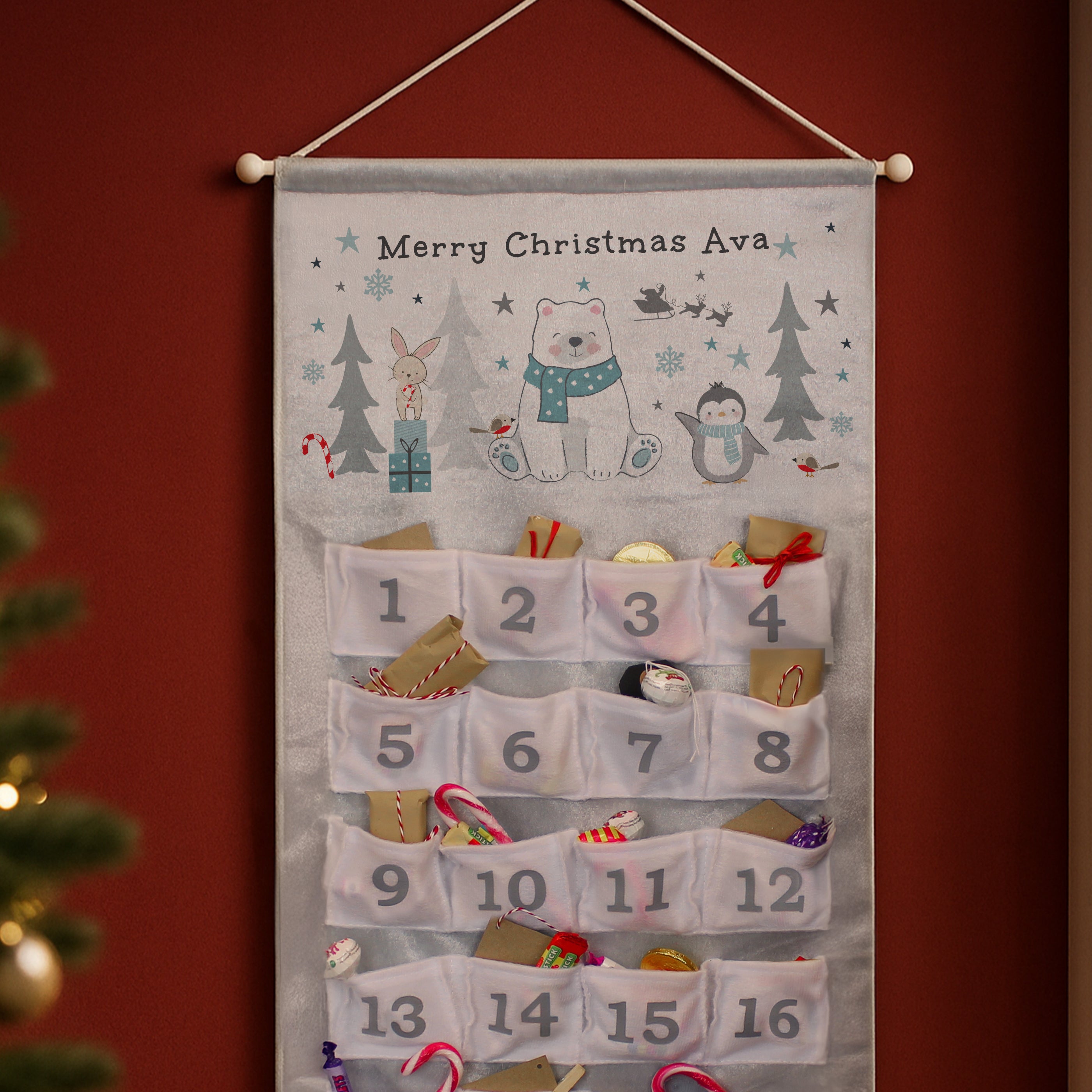Detail shot of the 24 pockets on the reusable fabric advent calendar, perfect for filling.