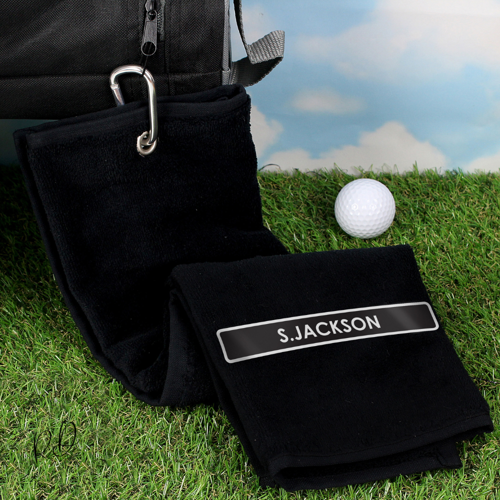 Black golf towel personalised with name in white embroidery