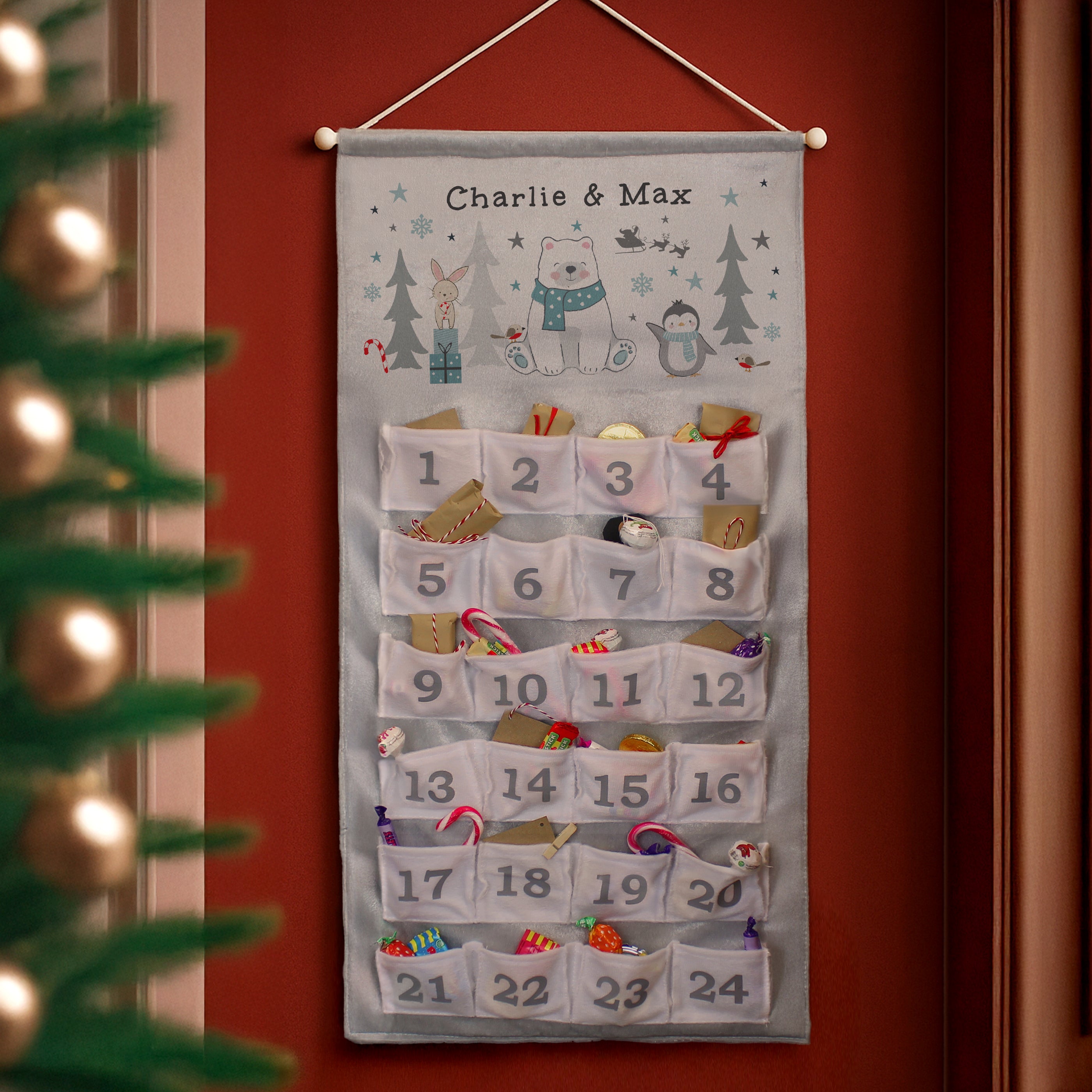Close-up of the custom personalised message line on the polar bear advent calendar.