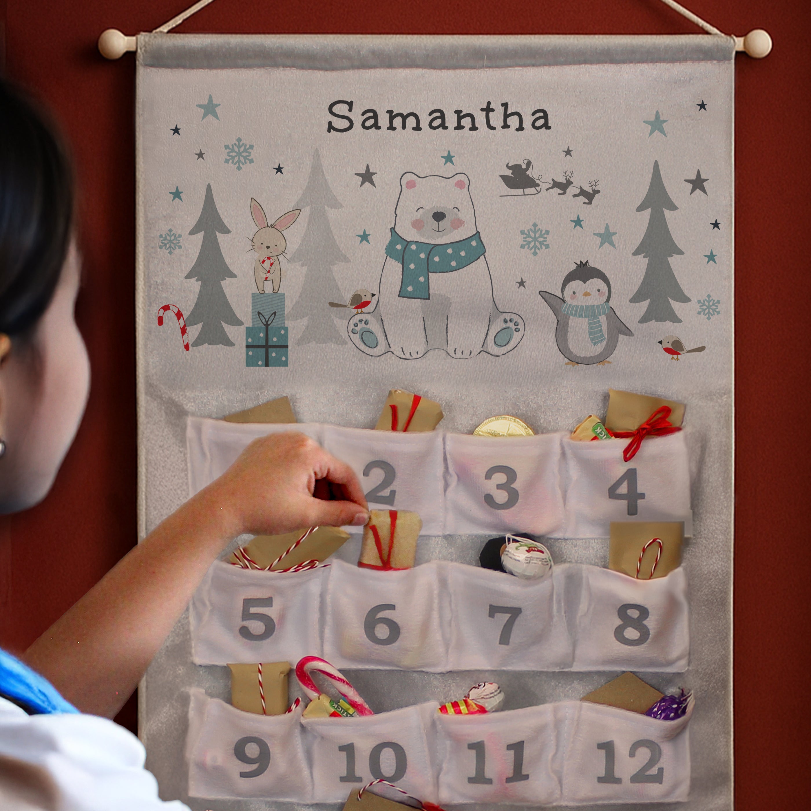 Durable polyester fabric quality and finish of the personalised wall advent calendar.