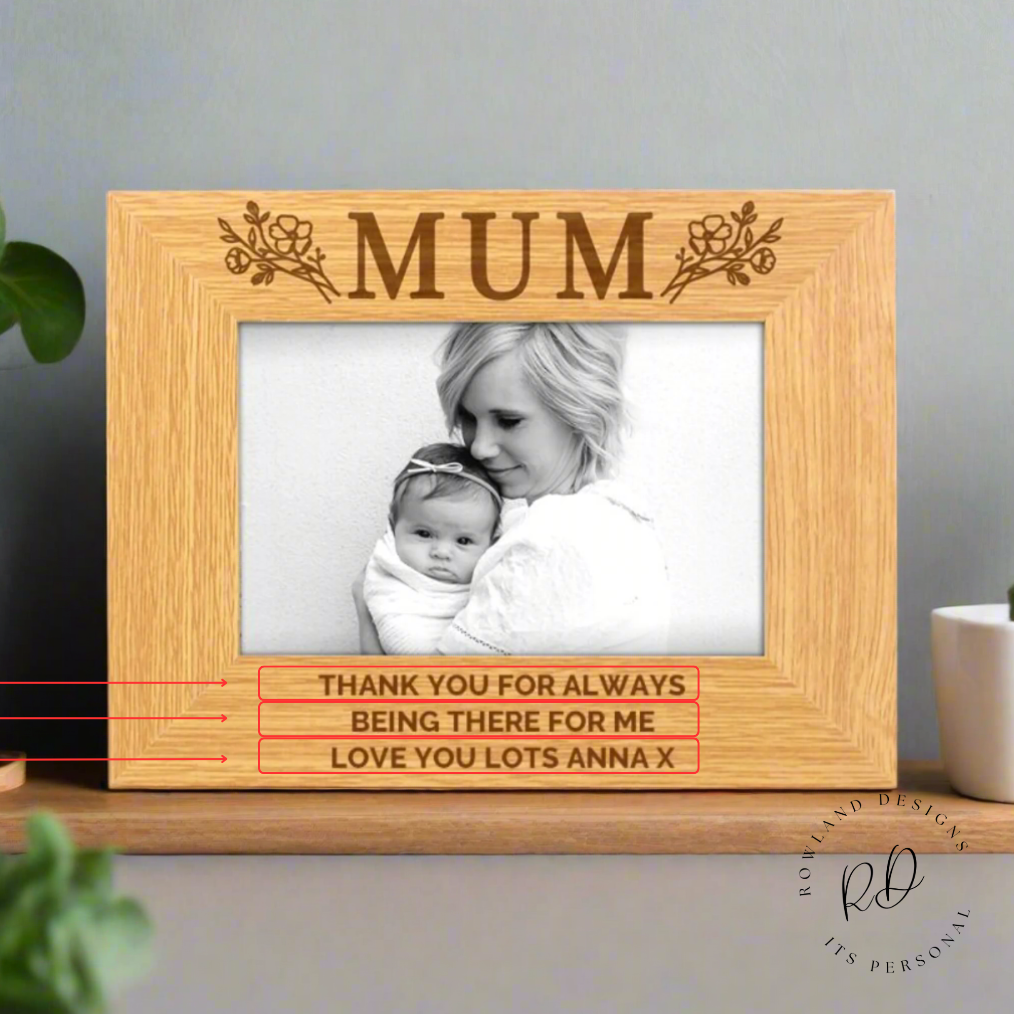 Close-up view of custom engraved floral 6x4 photo frame for mum.