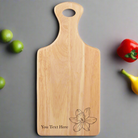 Floral personalised kitchen chopping board displayed as a rustic gift for nature lovers