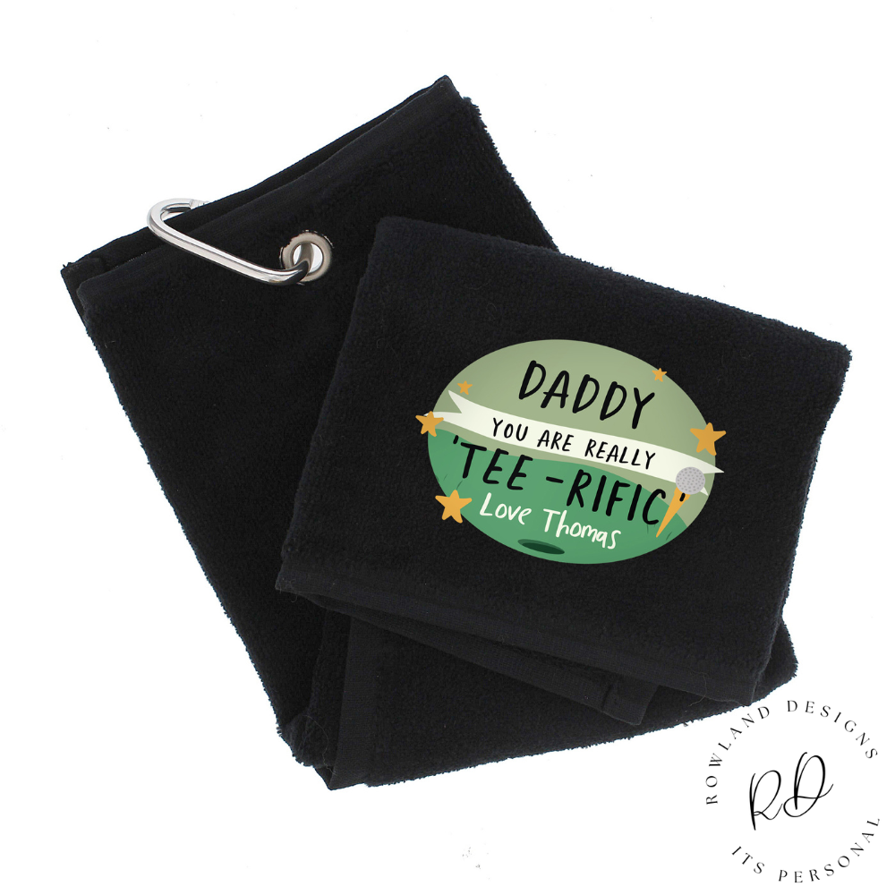 Golf towel featuring humorous message and carabiner clip