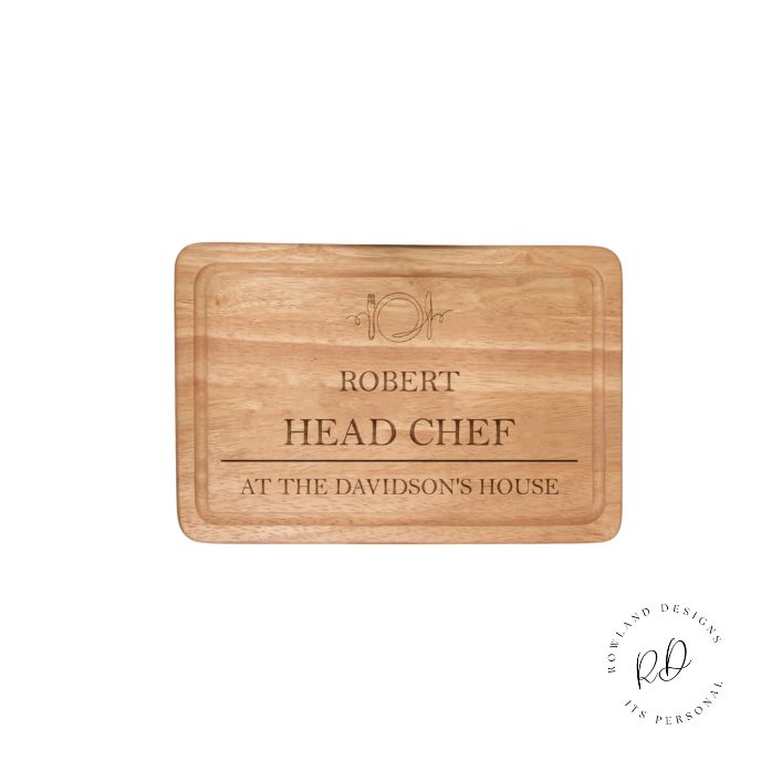 Wooden cutting board with engraved text on a white background