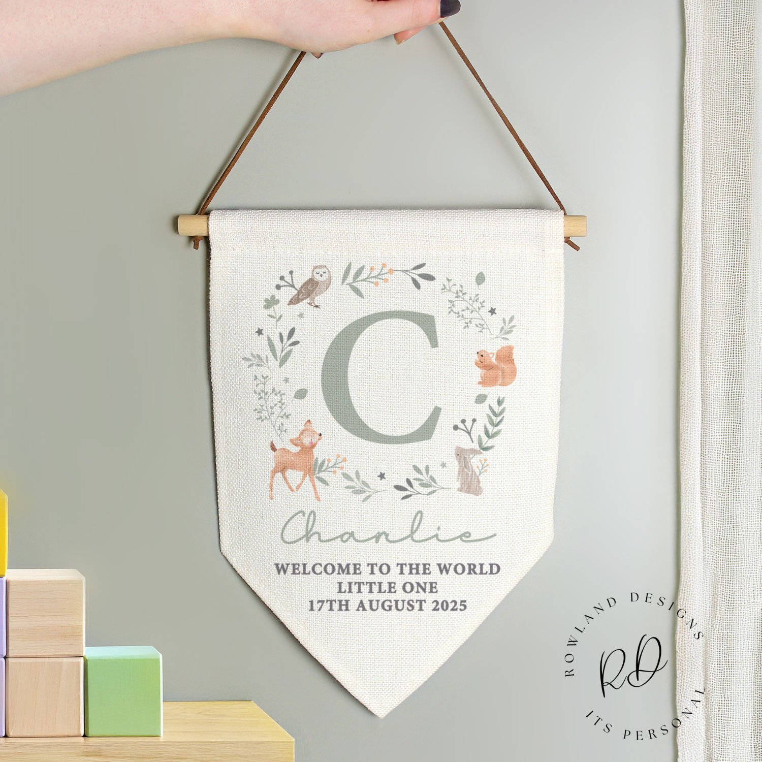 Hanging personalised rainbow baby banner for nursery wall – customisable new baby gift