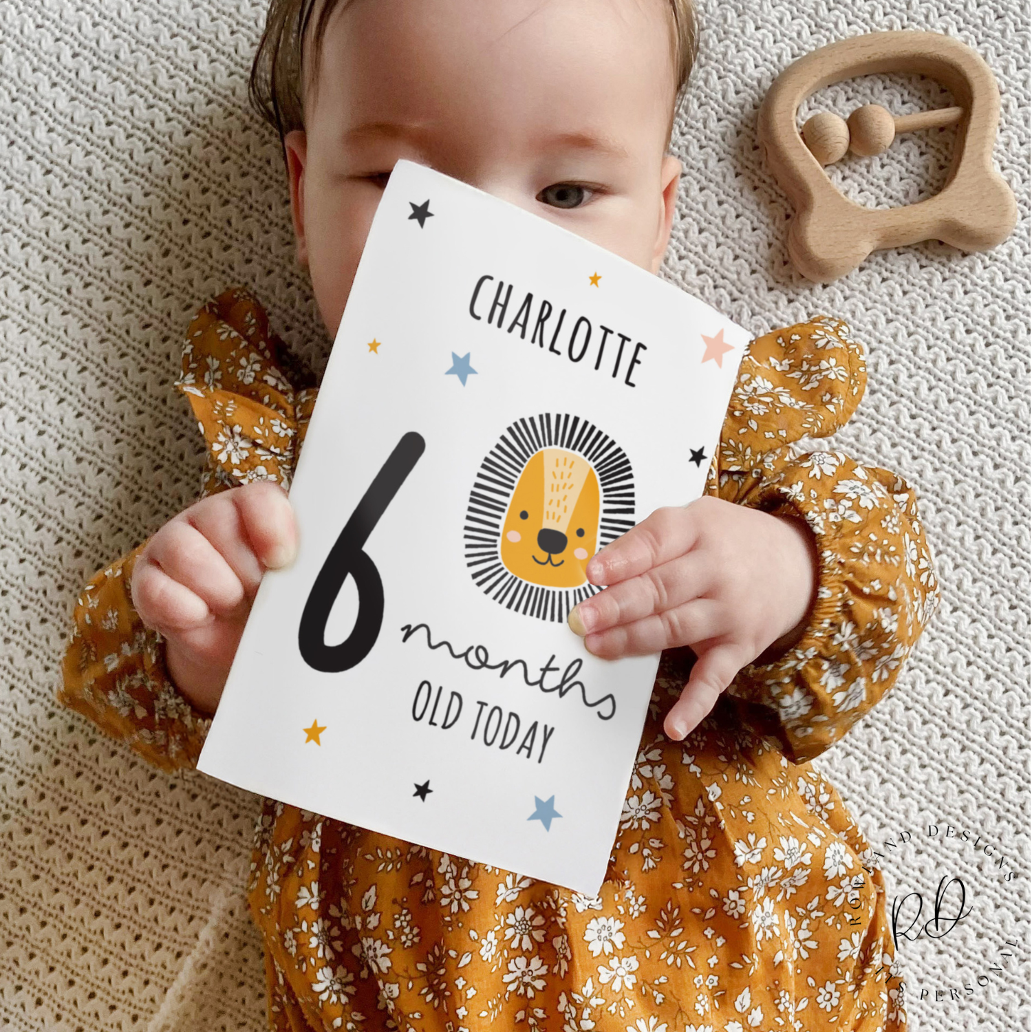 Front view of personalised baby milestone cards with animal illustrations
