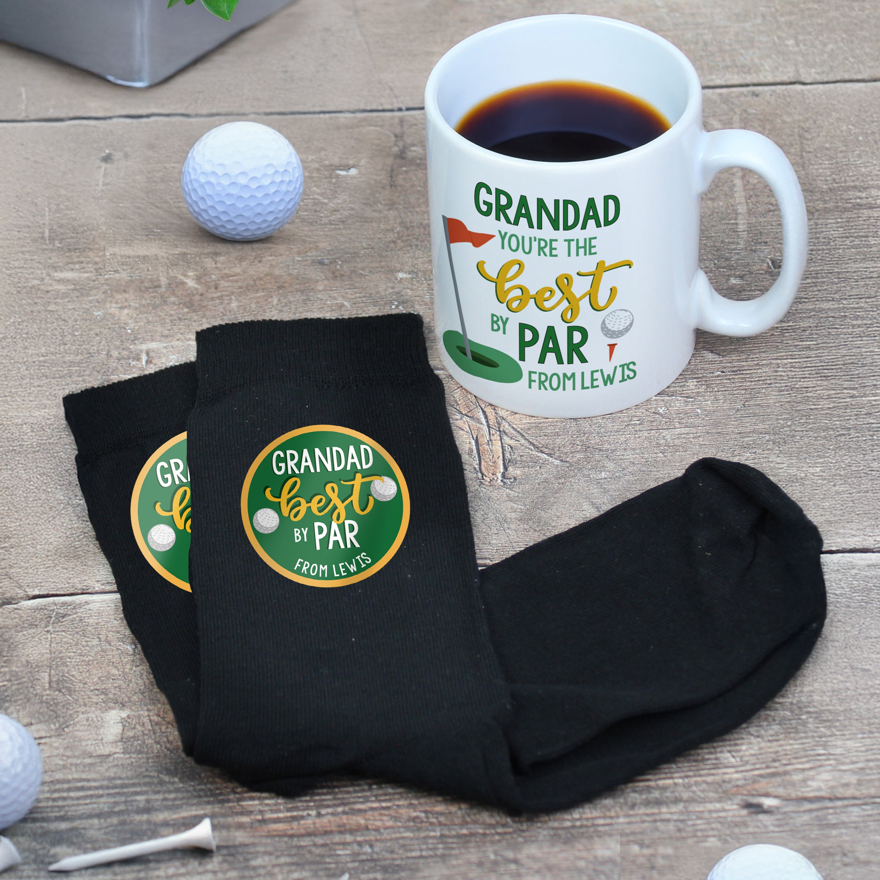 Personalised golf gift set featuring Best By Par mug and black socks
