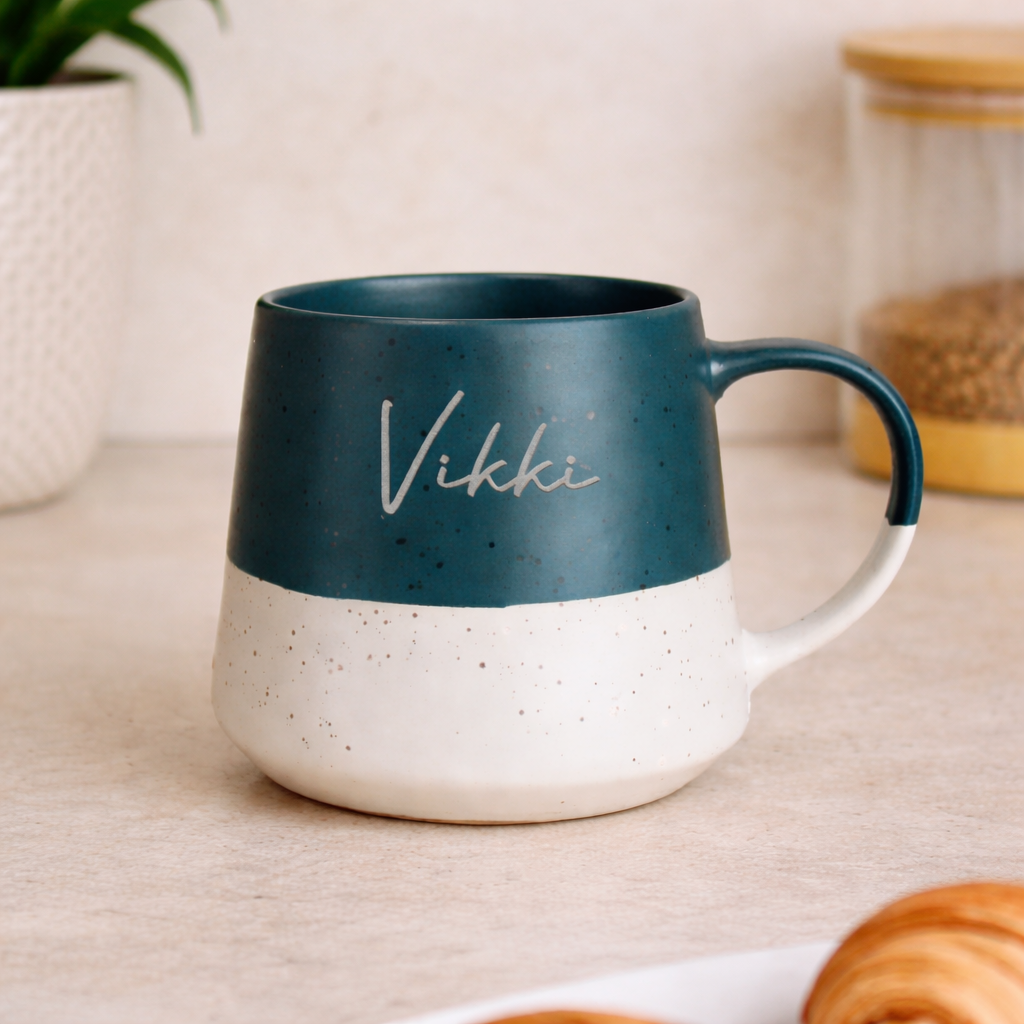 Personalised blue speckled ceramic mug with custom name on a two-tone design