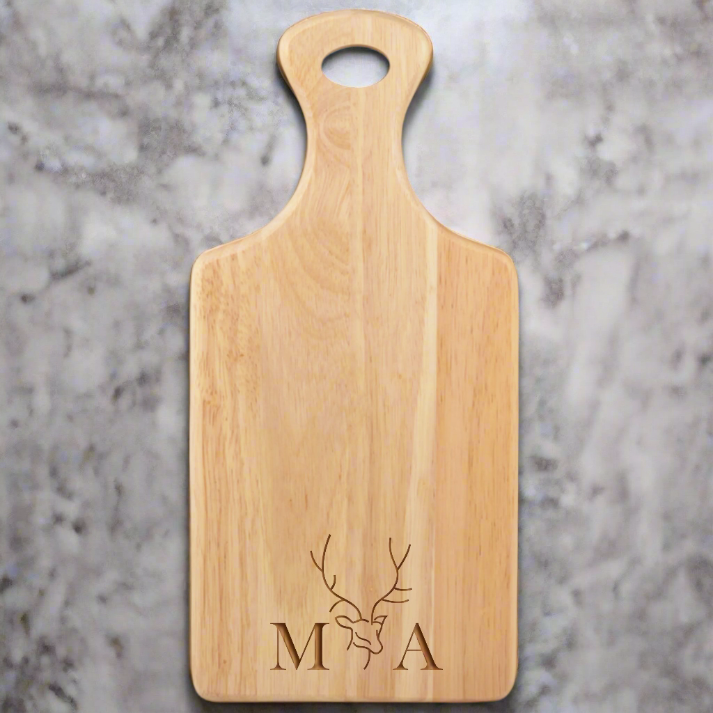 Personalised serving board with initials displayed as a couple’s gift