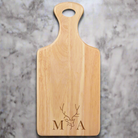 Personalised serving board with initials displayed as a couple’s gift
