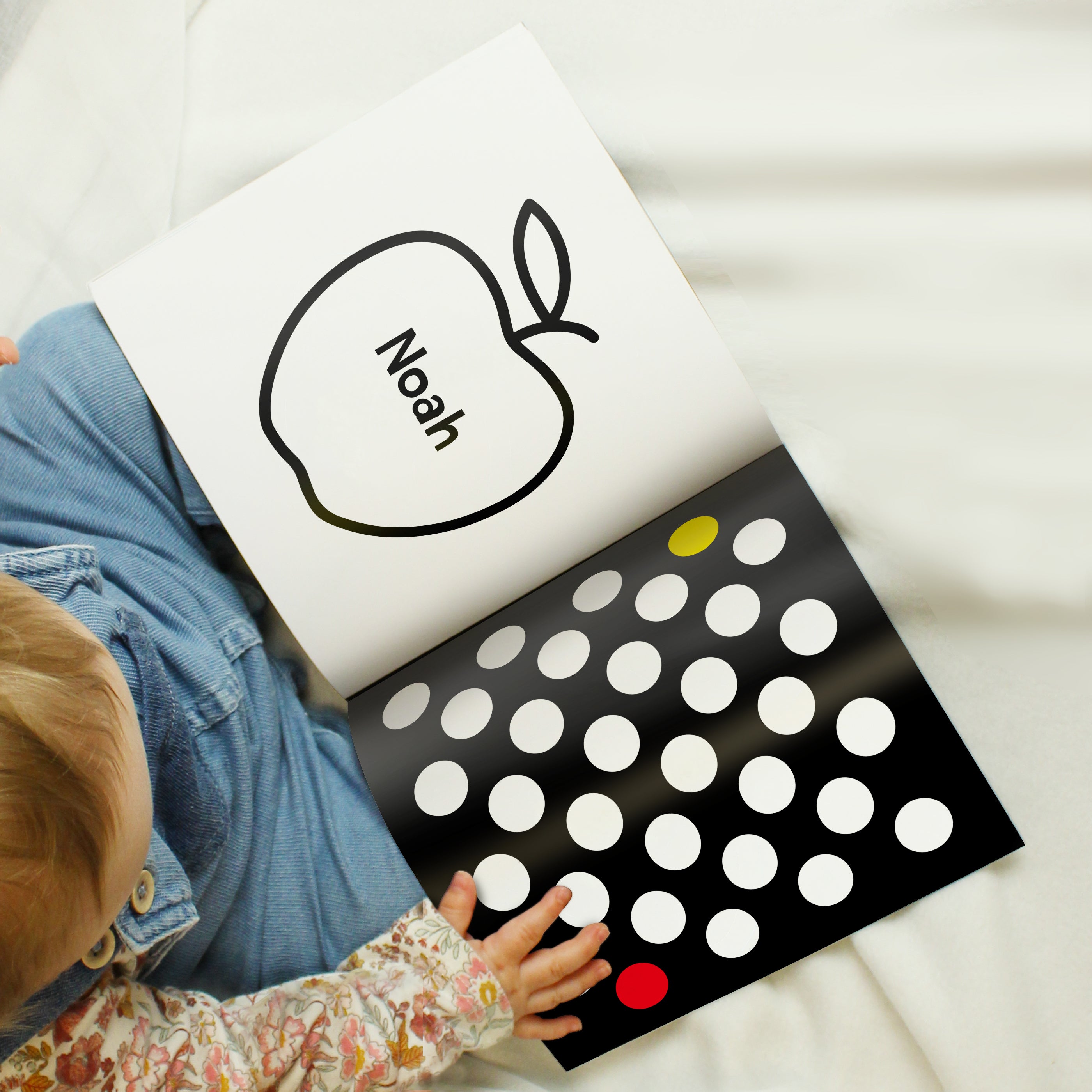 Customised baby book with black and white illustrations