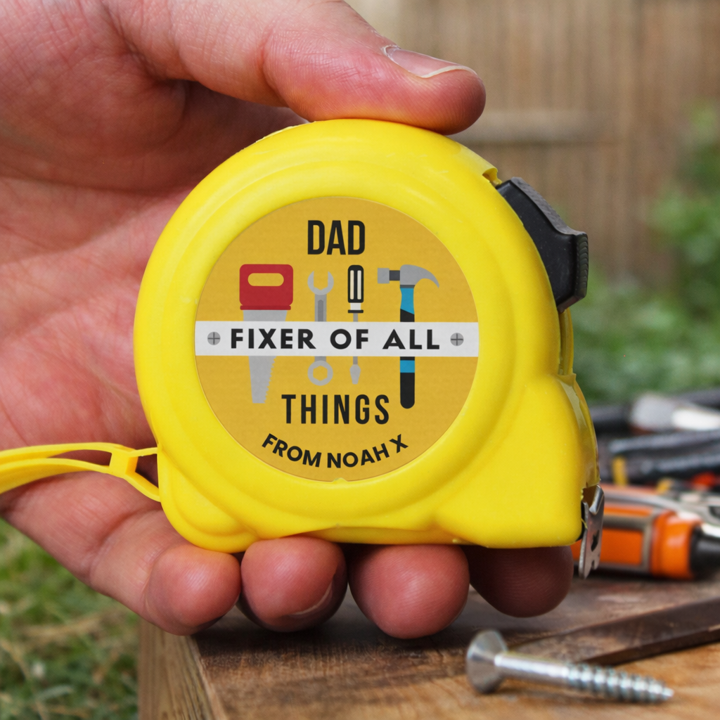 Personalised tape measure for Dad held in hand, ideal as a Father’s Day gift