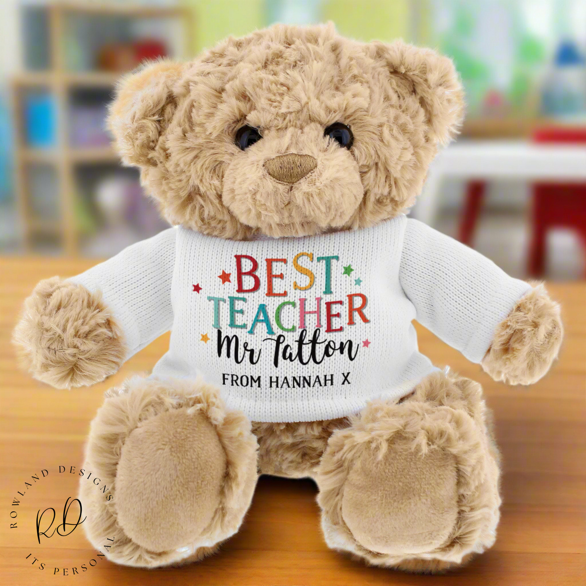 Front view of personalised teddy bear with “Best Teacher” text
