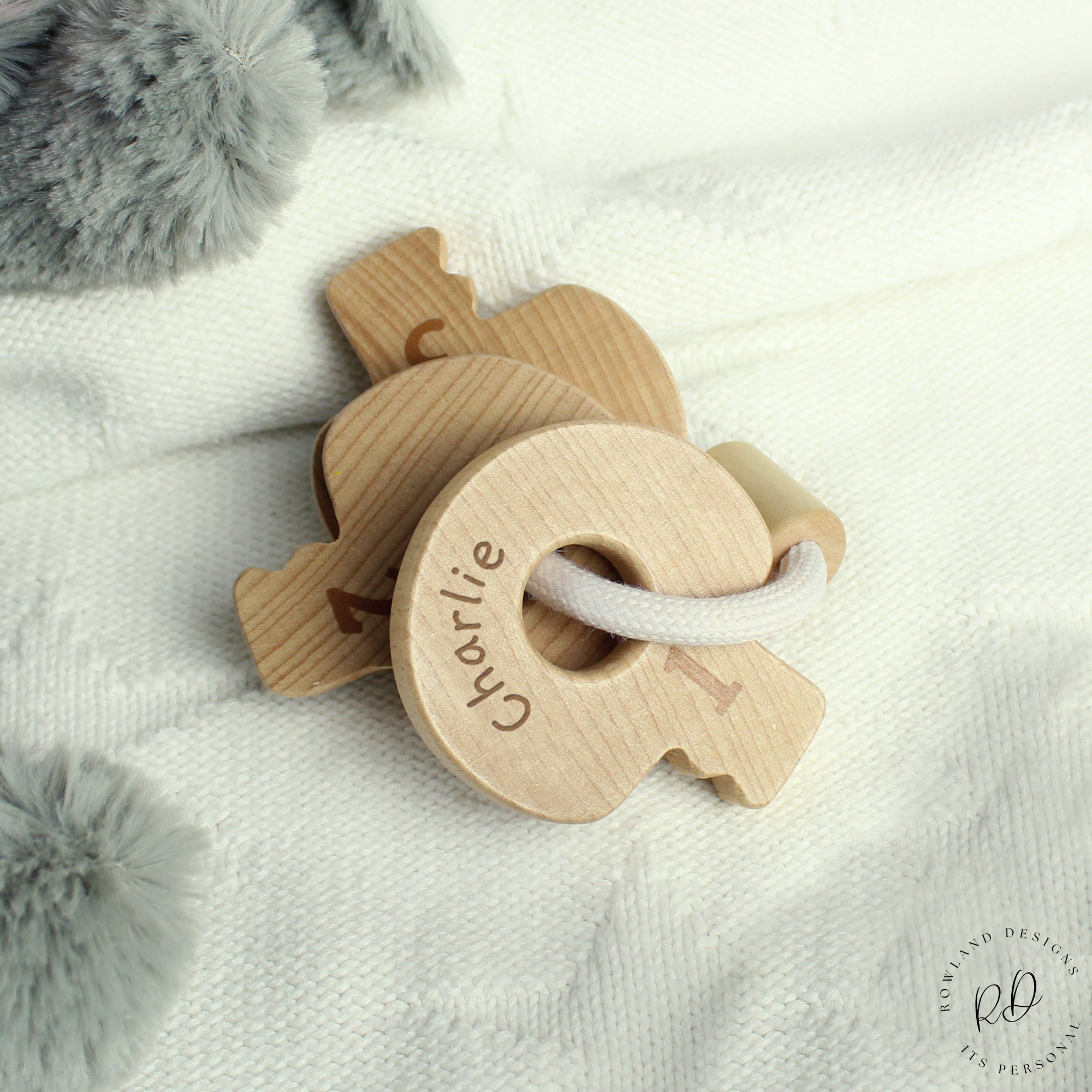Personalised wooden baby keys made from beech wood