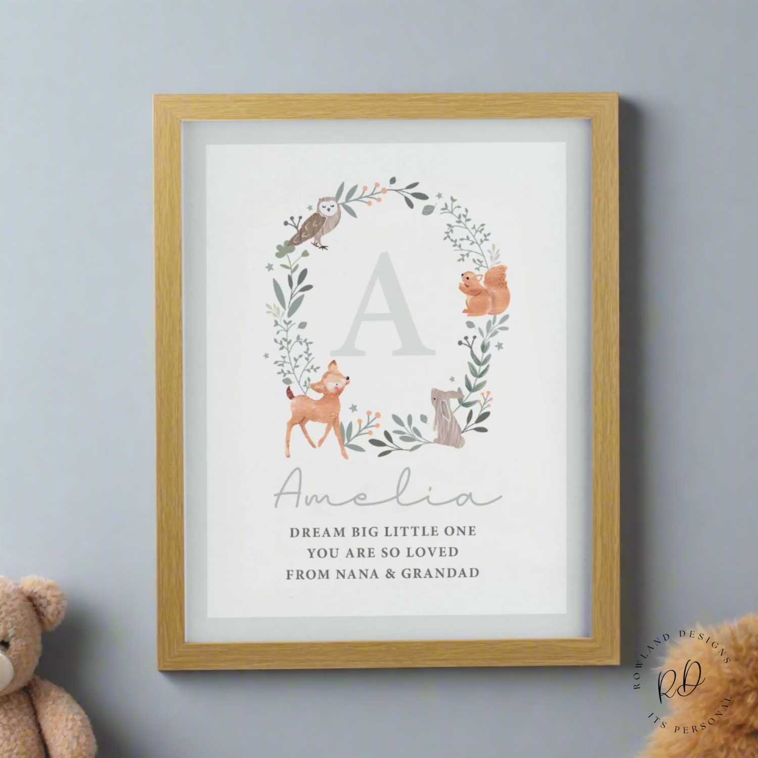 Personalised baby name frame with woodland theme in oak
