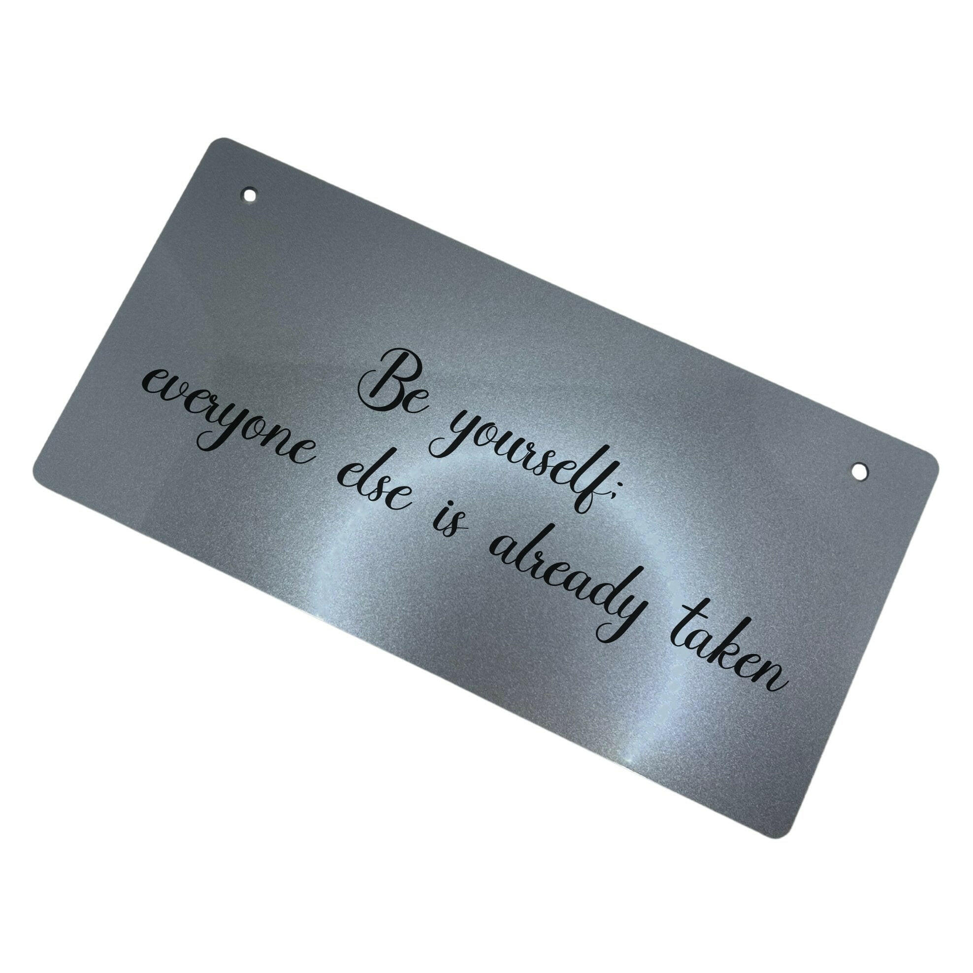 A Be Yourself quote sign, perfect for a home office or study.