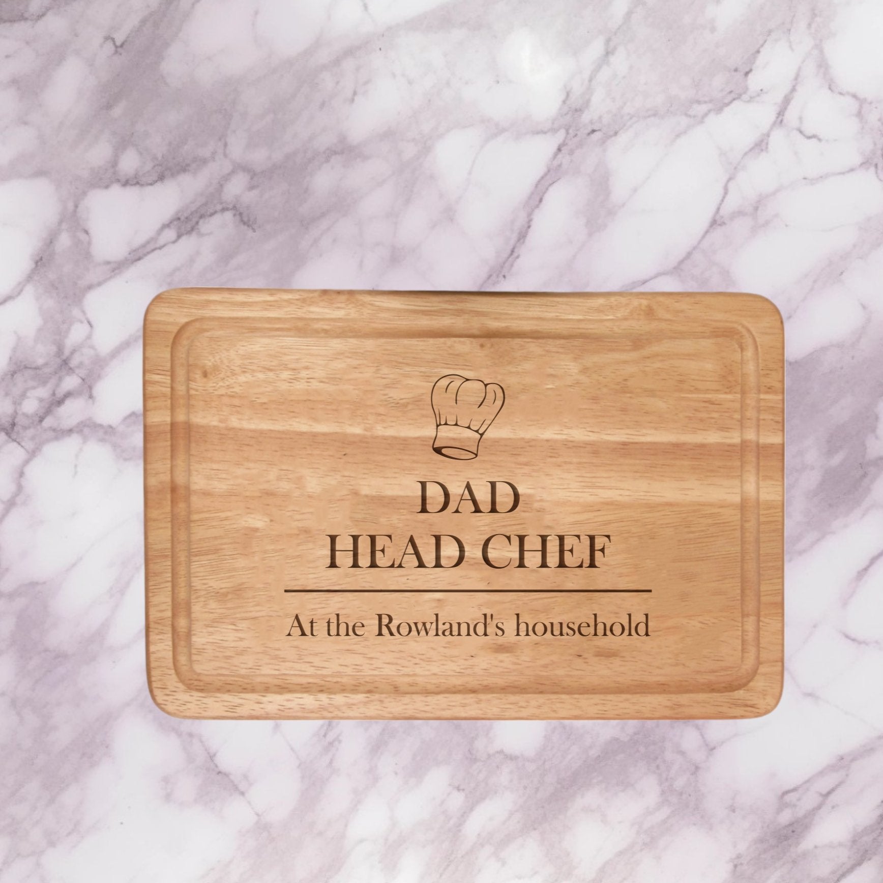 Elevate your kitchen with our 300mmX200mm Personalized Chopping Board. Crafted from premium Hevea Wood, this board features intricate laser-engraved customization, including up to 3 lines of text (20 characters each) and a charming chef hat detail. Ideal for special occasions or daily use. Hand-wash only. Order now for a unique, lasting addition to your culinary space!