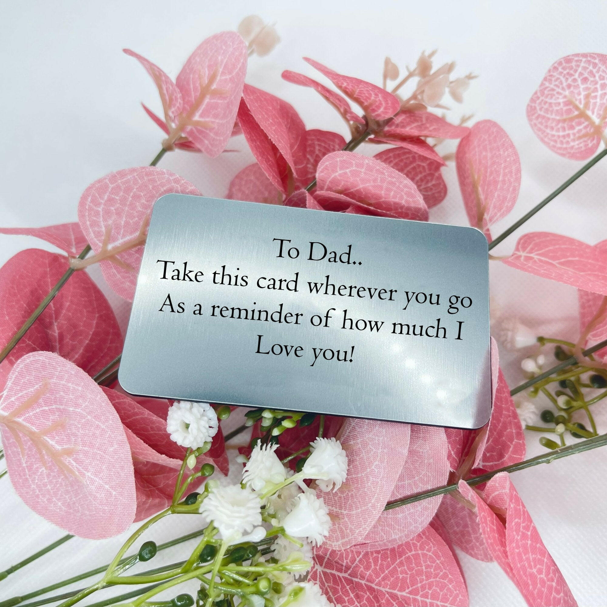 A wallet card insert for Dad, engraved with a sentimental message.