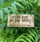 "Durable 3mm Thick Acrylic 'Please Keep the Gate Closed' Sign" Description: A sturdy sign made from 3mm thick acrylic material, laser-engraved with the message "Please Keep the Gate Closed, No Matter What the Dog Says." The sign is built to withstand wear and tear.