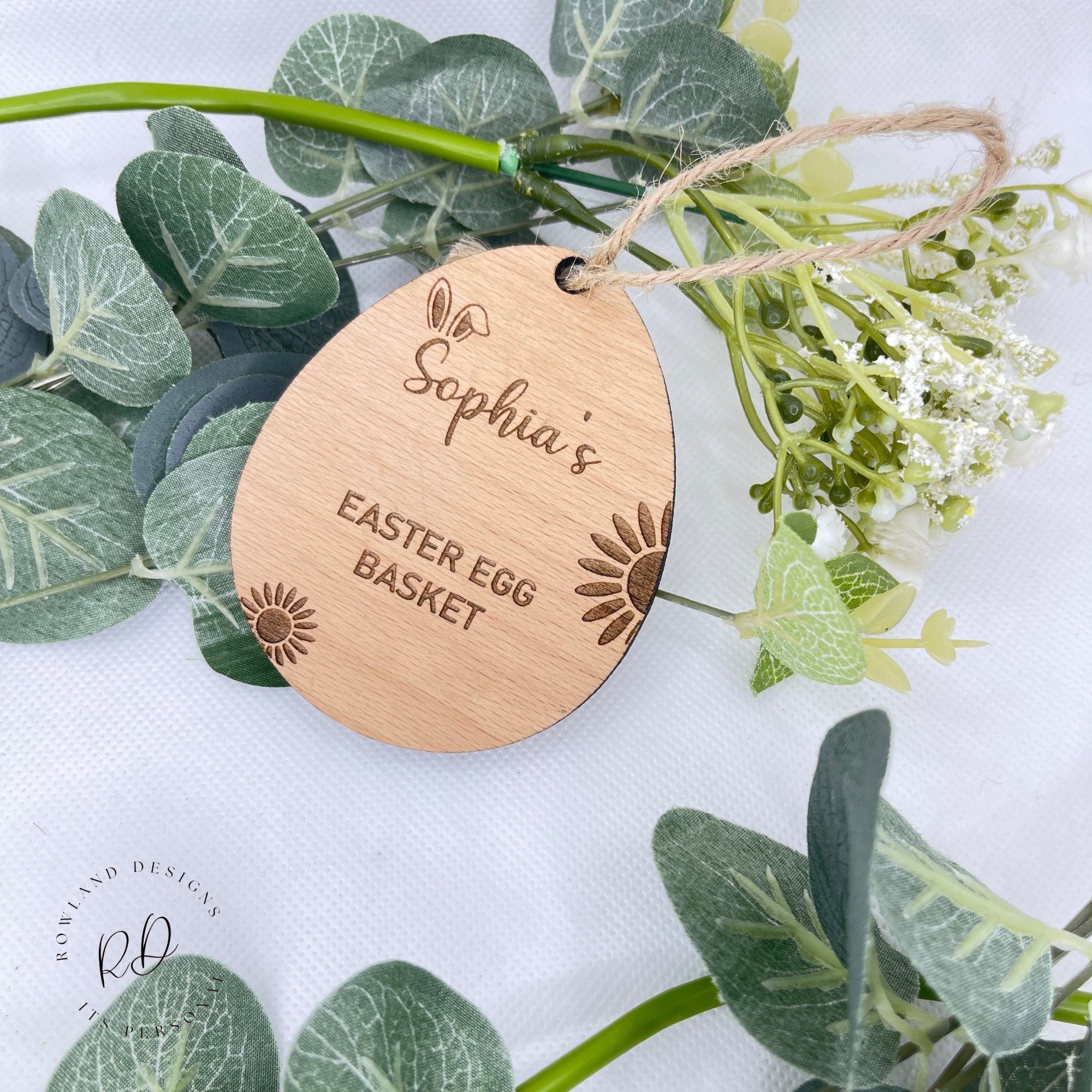 A personalised wooden Easter basket tag with a custom engraved name.