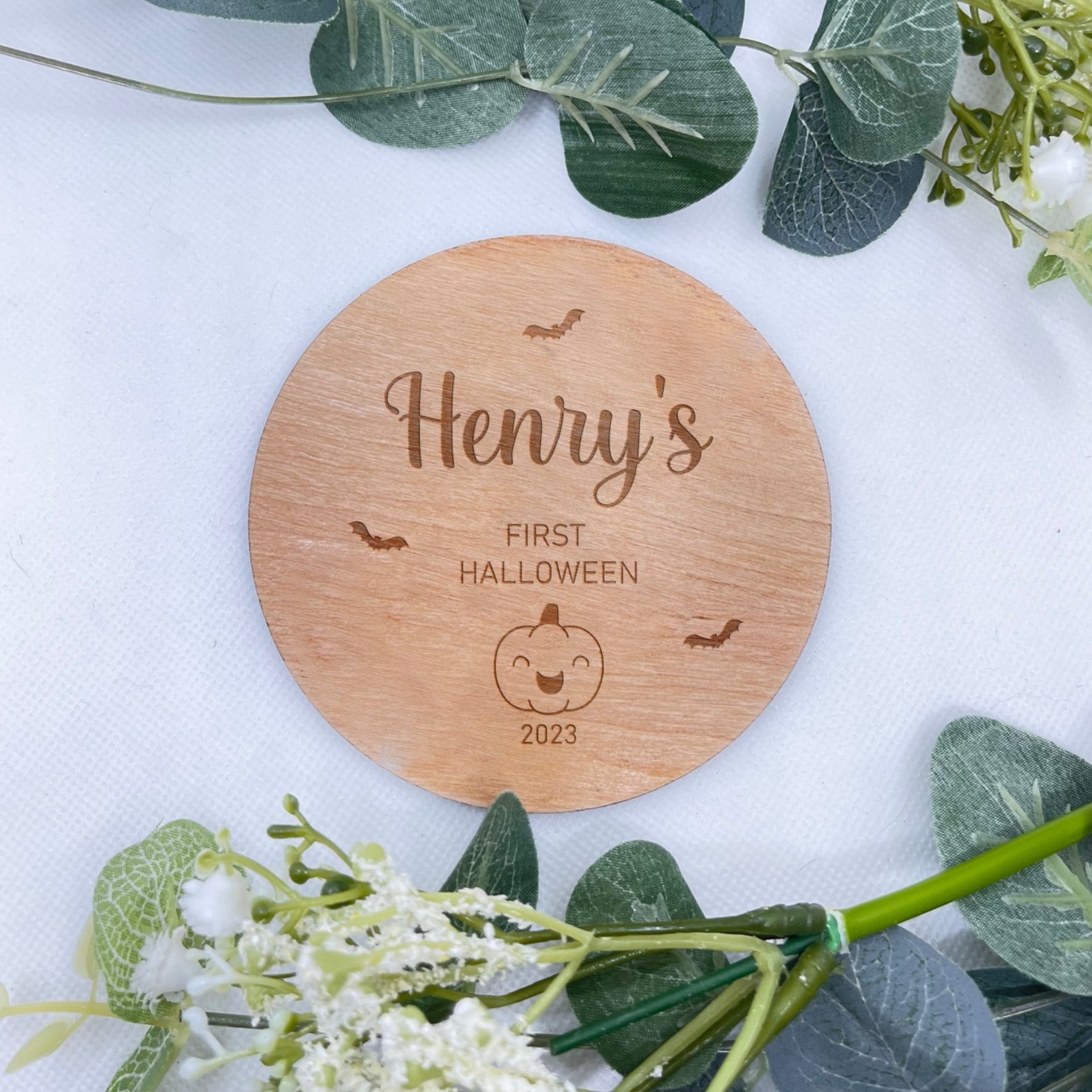 Engraved Wooden Plaque for Baby's First Halloween with green Leaves