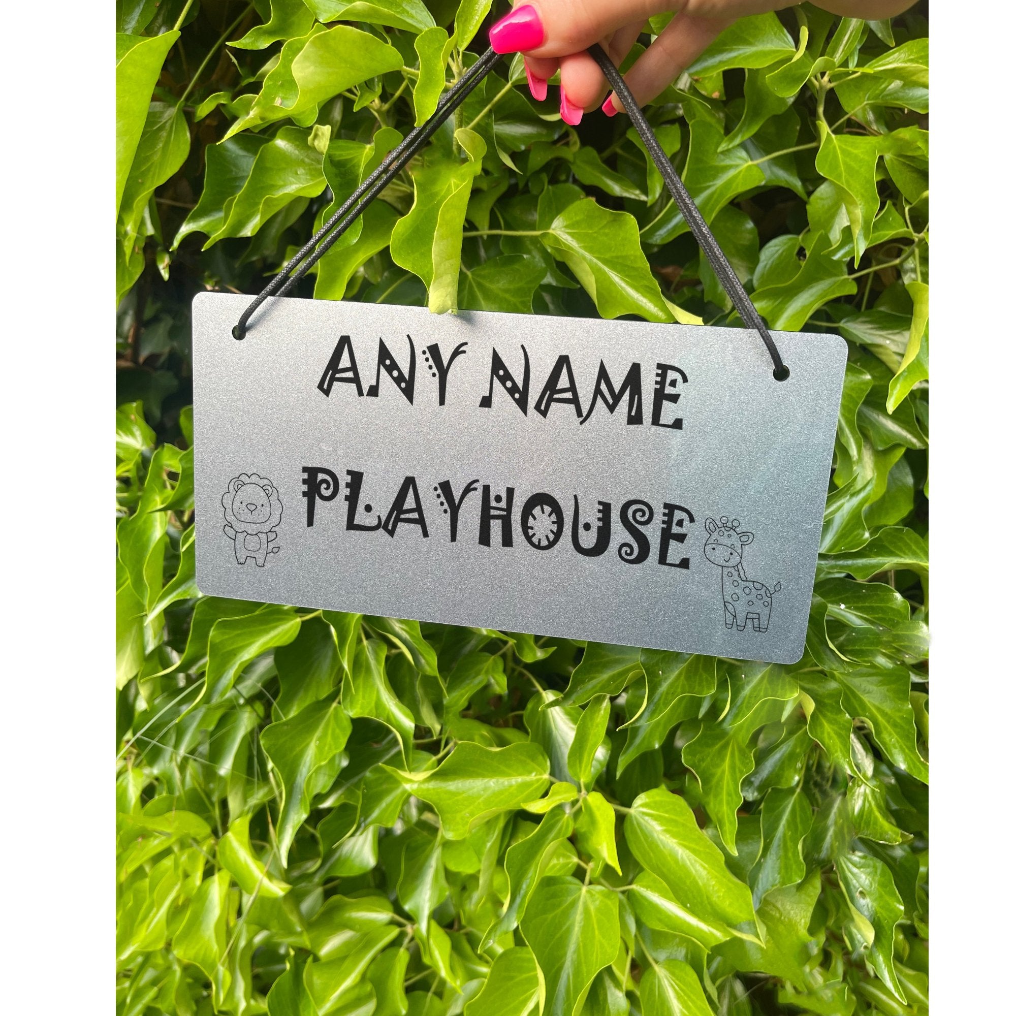 A personalised acrylic plaque with a child's name, styled as a fun decor piece for a bedroom or playroom wall.