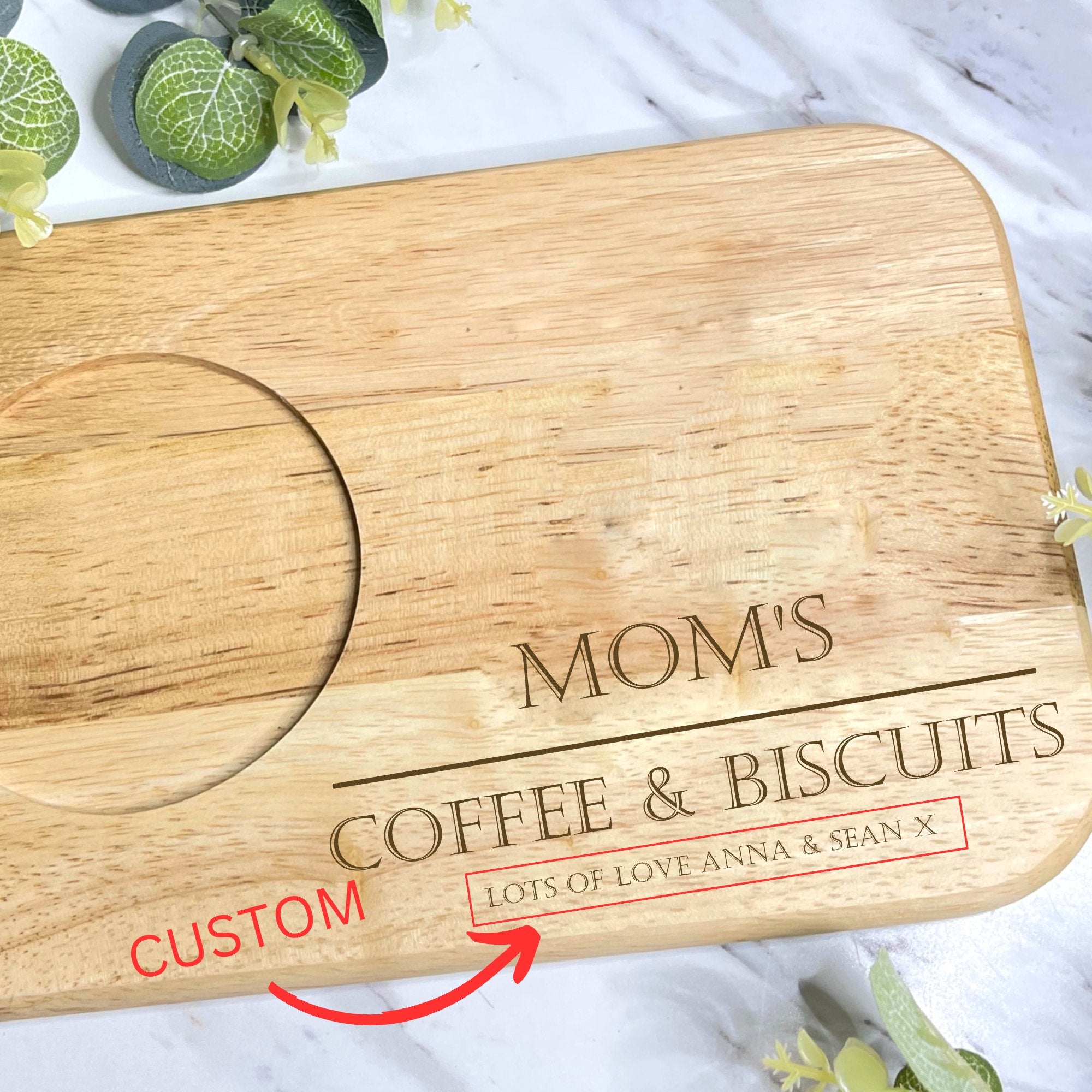 A collection of diverse images showcasing the Tea & Biscuit Board's intricate woodwork, personalized engravings, and versatile usage. An ideal gift for occasions such as Mother's Day, birthdays, and Christmas. Board dimensions: 23cm x 15cm x 1.5cm, perfect for hosting delightful afternoon tea experiences with a touch of sophistication.