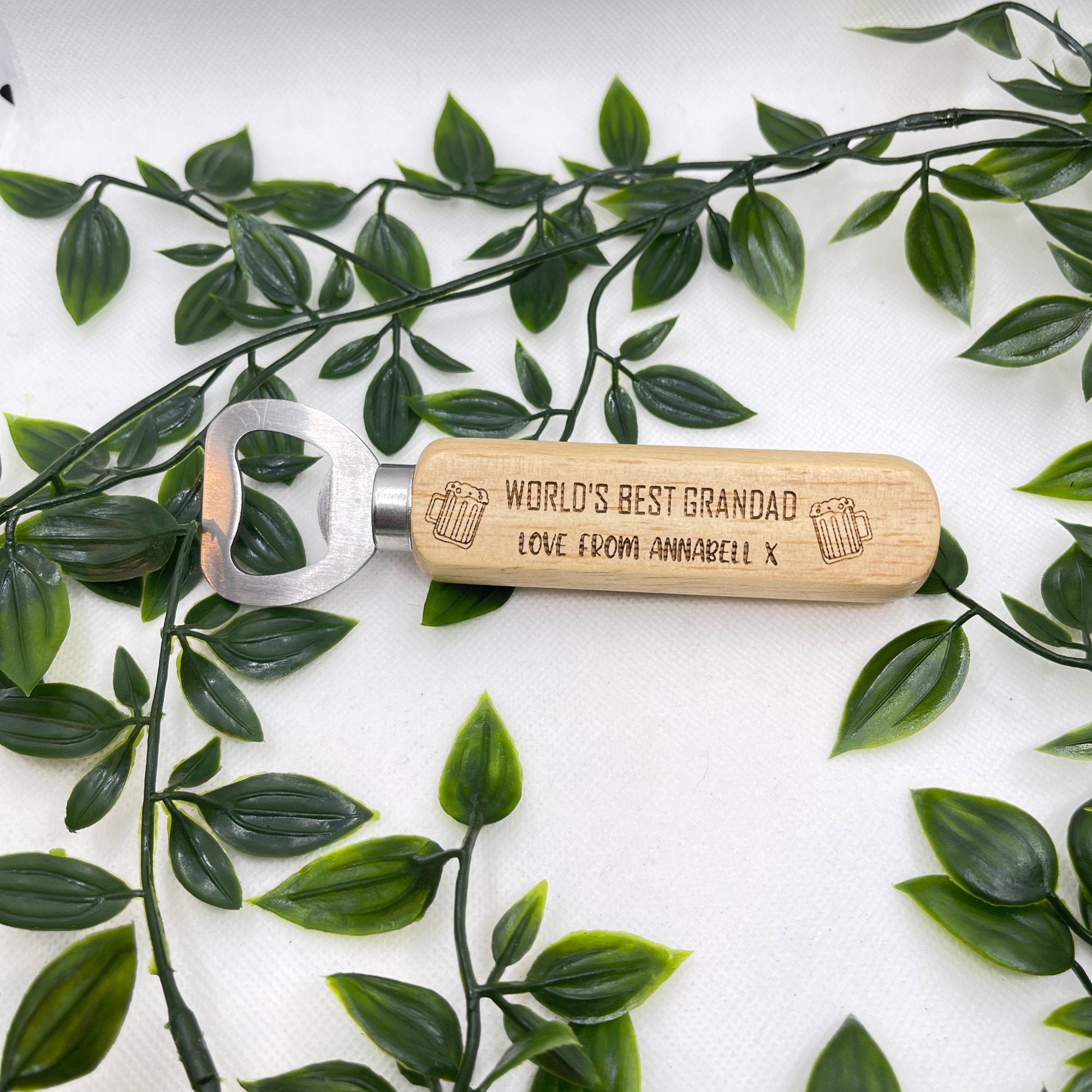 Engraved Wooden Handle Bottle Opener - Beer Design: Features an engraved beer glasses design, perfect for beer enthusiasts. Customizable, solid wood handle with durable metal opener. Dimensions: L:14cm W:4cm H:2cm.