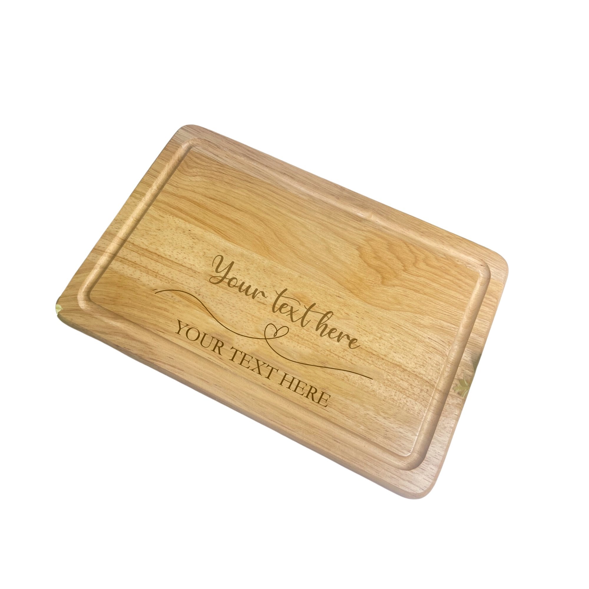 A full view of a personalised wooden chopping board with a heart and custom engraved text.