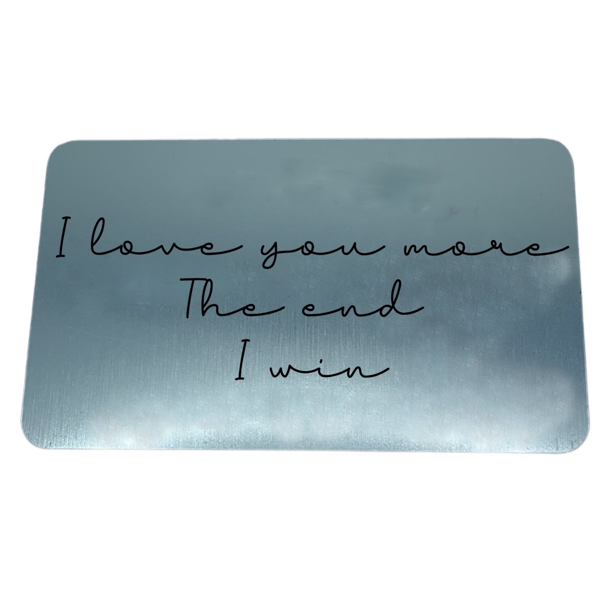 A silver engraved wallet card with the "I love you more" message, a perfect keepsake gift for a loved one.