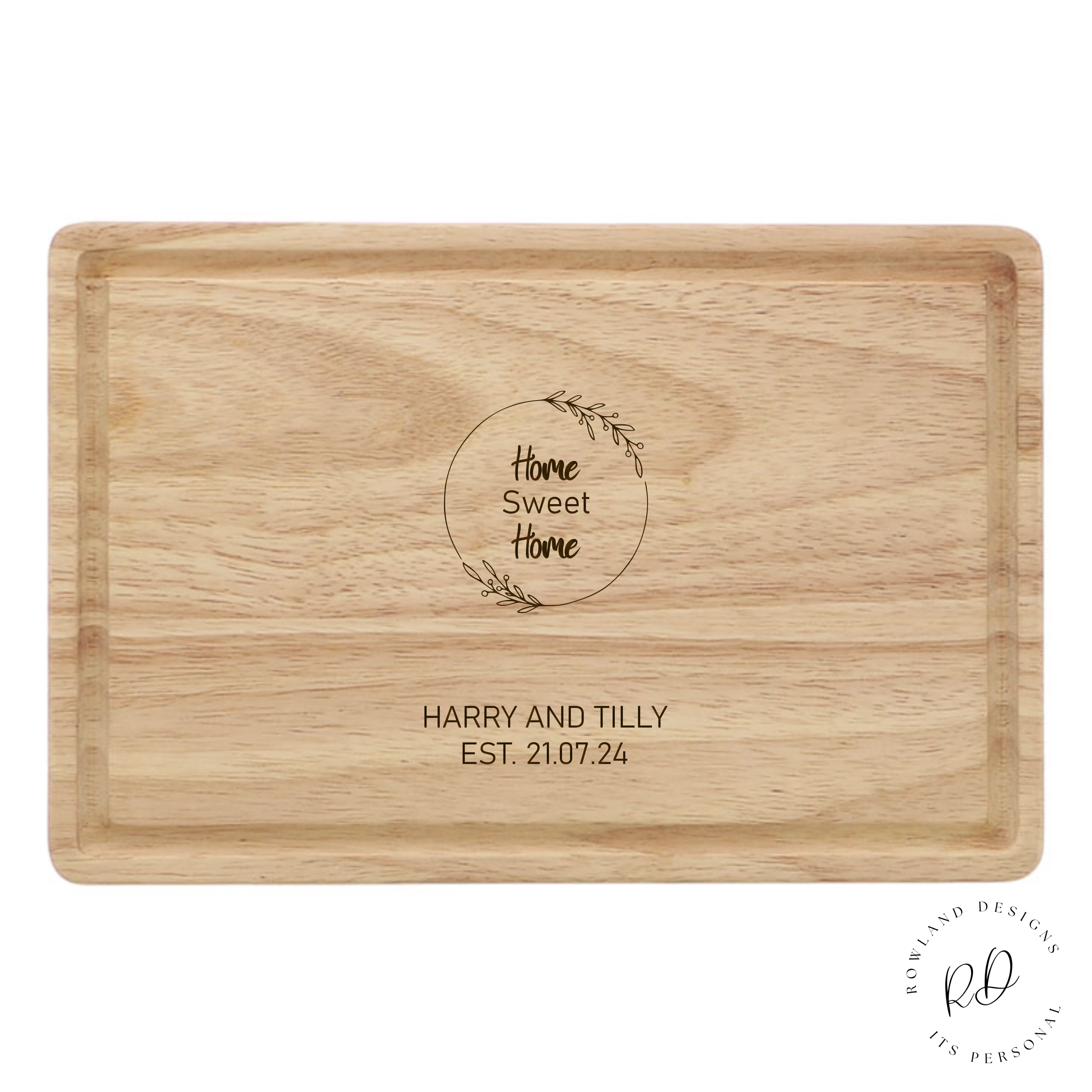 A wooden chopping board engraved with 'Home Sweet Home'. Ideal for new homeowners, this personalized kitchen accessory combines functionality with sentimental value, crafted from durable high-quality wood to last as a cherished keepsake. Personalise at bottom with 2 lines of text. 