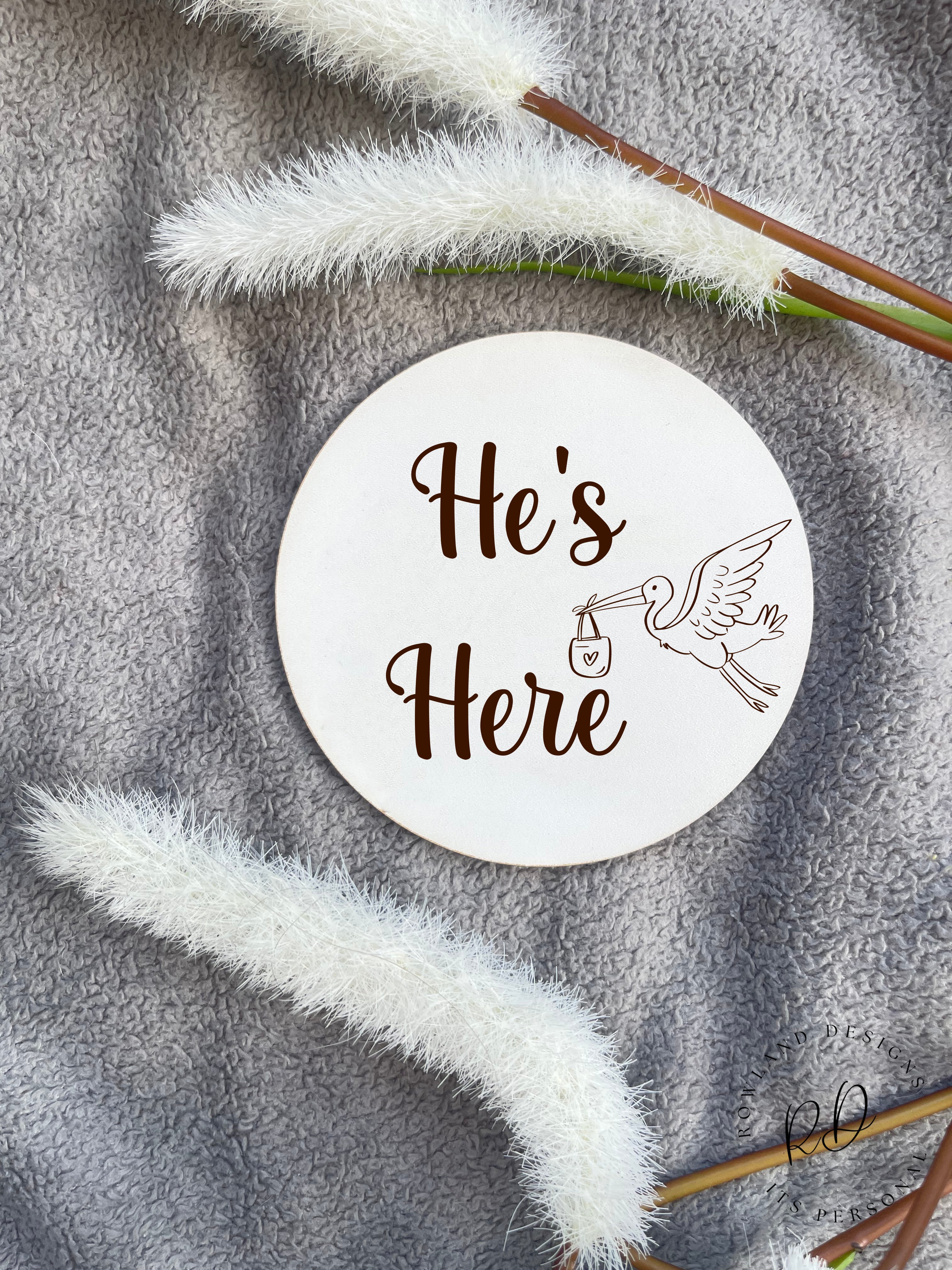 Newborn Welcome Plaque – 'He’s Here' Baby Announcement Plaque, made from durable veneer or MDF, ideal for baby shower gifts and keepsakes.