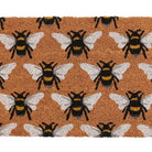 Natural Bee Print Doormat placed at the entrance of a home, adding a nature-inspired touch.