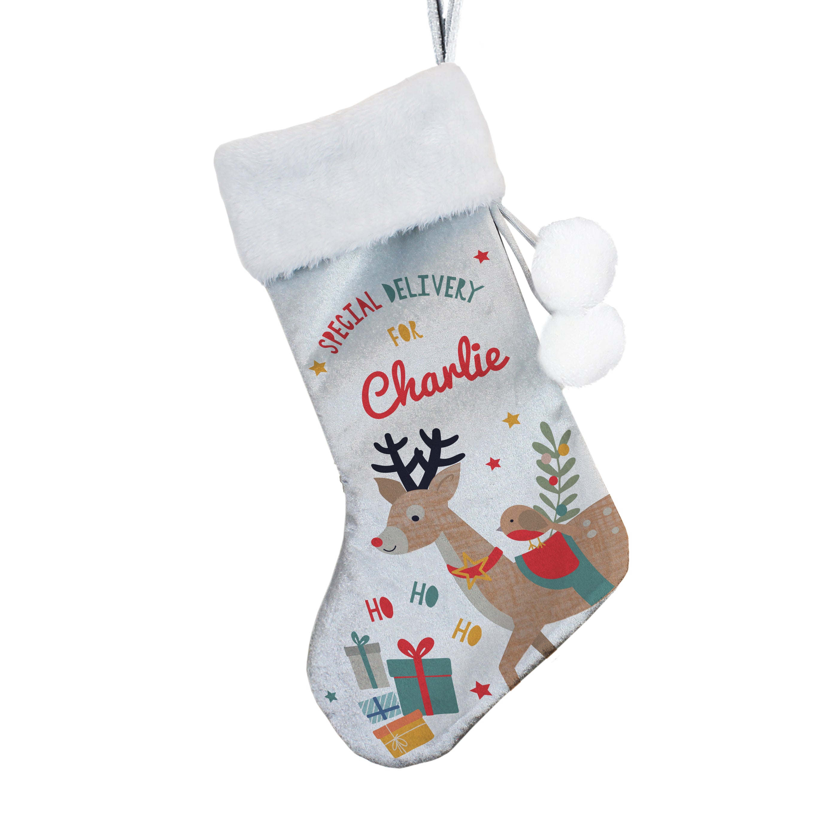 Velvet Christmas stocking ready to be hung on the mantelpiece for a child.

