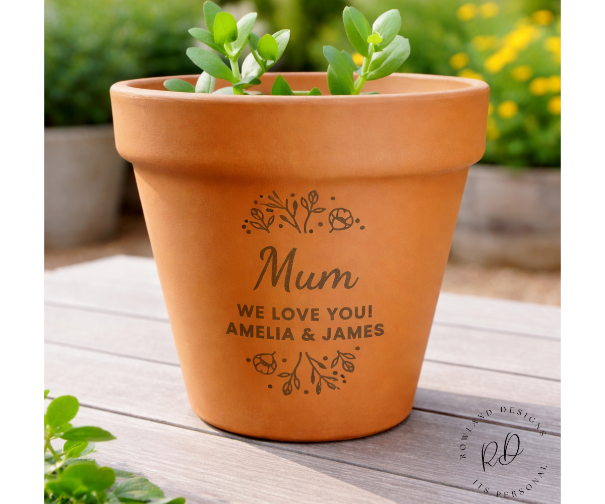 Custom engraved floral terracotta plant pot with personalised text