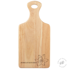 Close-up of floral daffodil engraving on personalised wooden chopping board