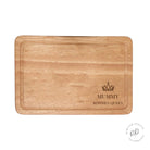 Engraved queen crown personalised chopping board displayed in kitchen