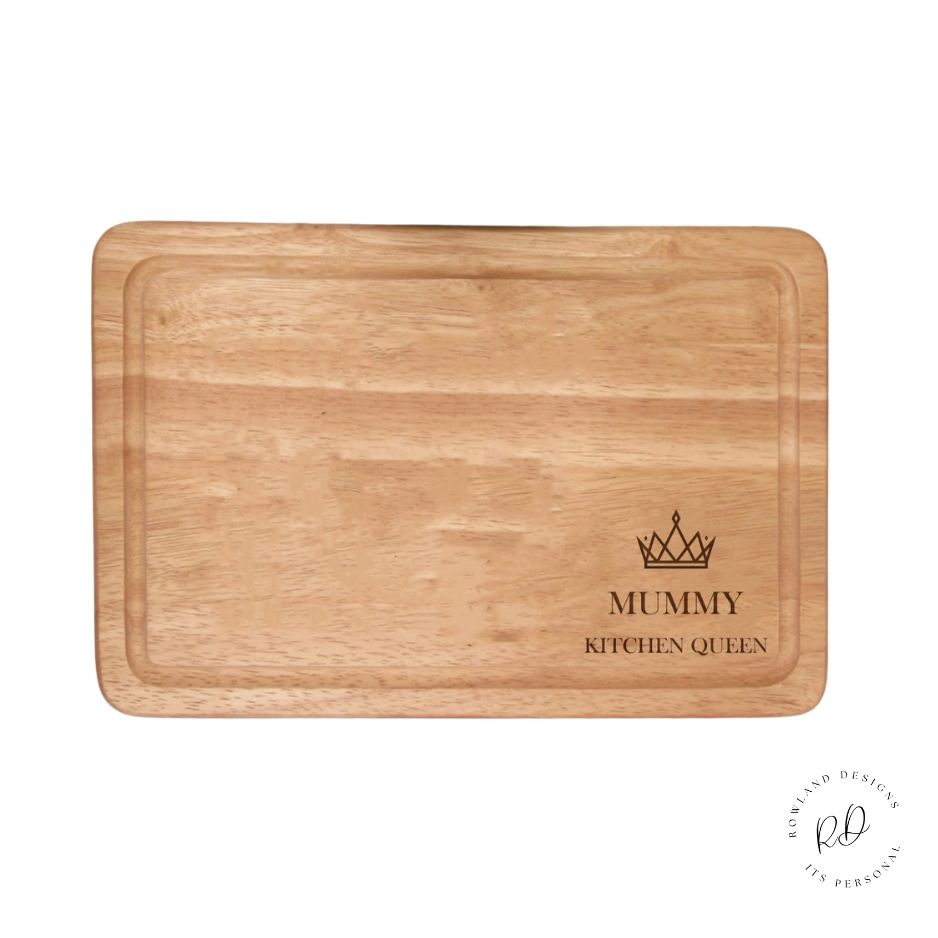 Engraved queen crown personalised chopping board displayed in kitchen
