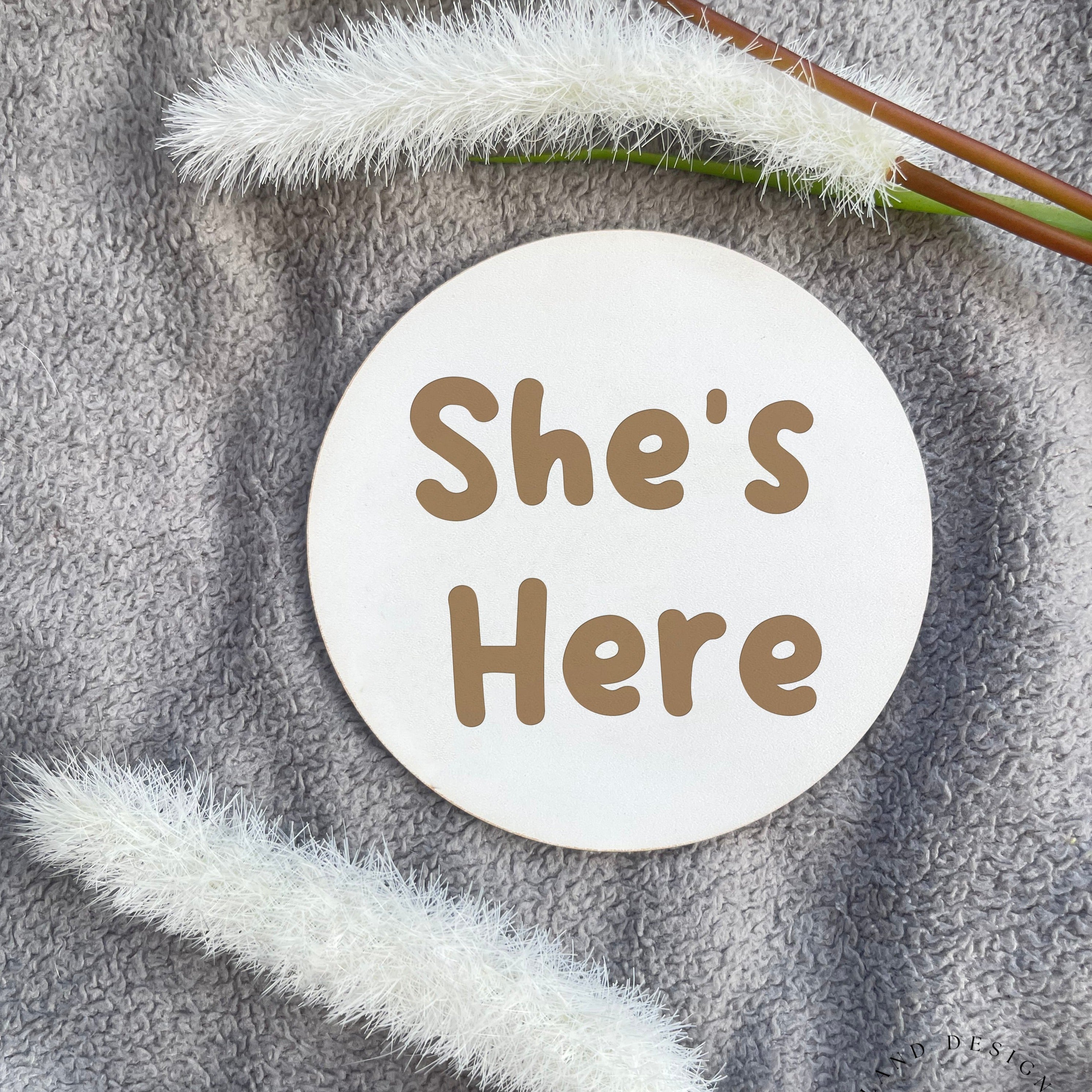 An engraved welcome-to-the-world photo prop, a thoughtful gift for new parents.