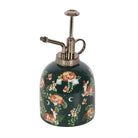 Angled view of ceramic mister with fawn and fox design
