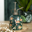 Side view of woodland animal ceramic plant mister
