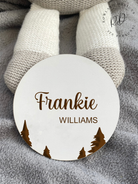 Modern white baby announcement plaque with tree design, ideal for gender-neutral nursery reveals.