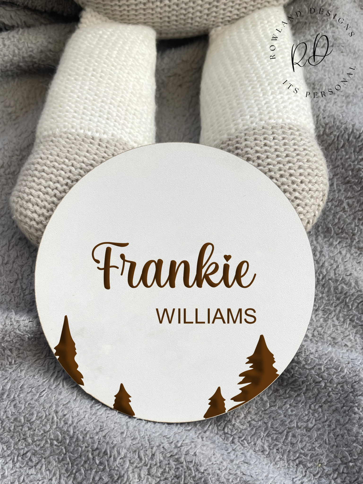 Modern white baby announcement plaque with tree design, ideal for gender-neutral nursery reveals.