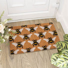 Front view of the Natural Bee Print Doormat with a charming bee design.