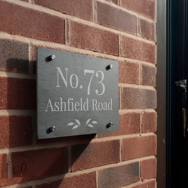 Outdoor leaf slate house address number sign with engraving