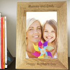 Personalised 5x7 oak finish photo frame with custom engraving.