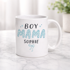 White mug with 'BOY MAMA SOPHIE' text on a marble surface