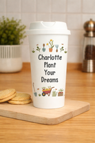 Personalised gardening travel mug with plant themed design and custom name